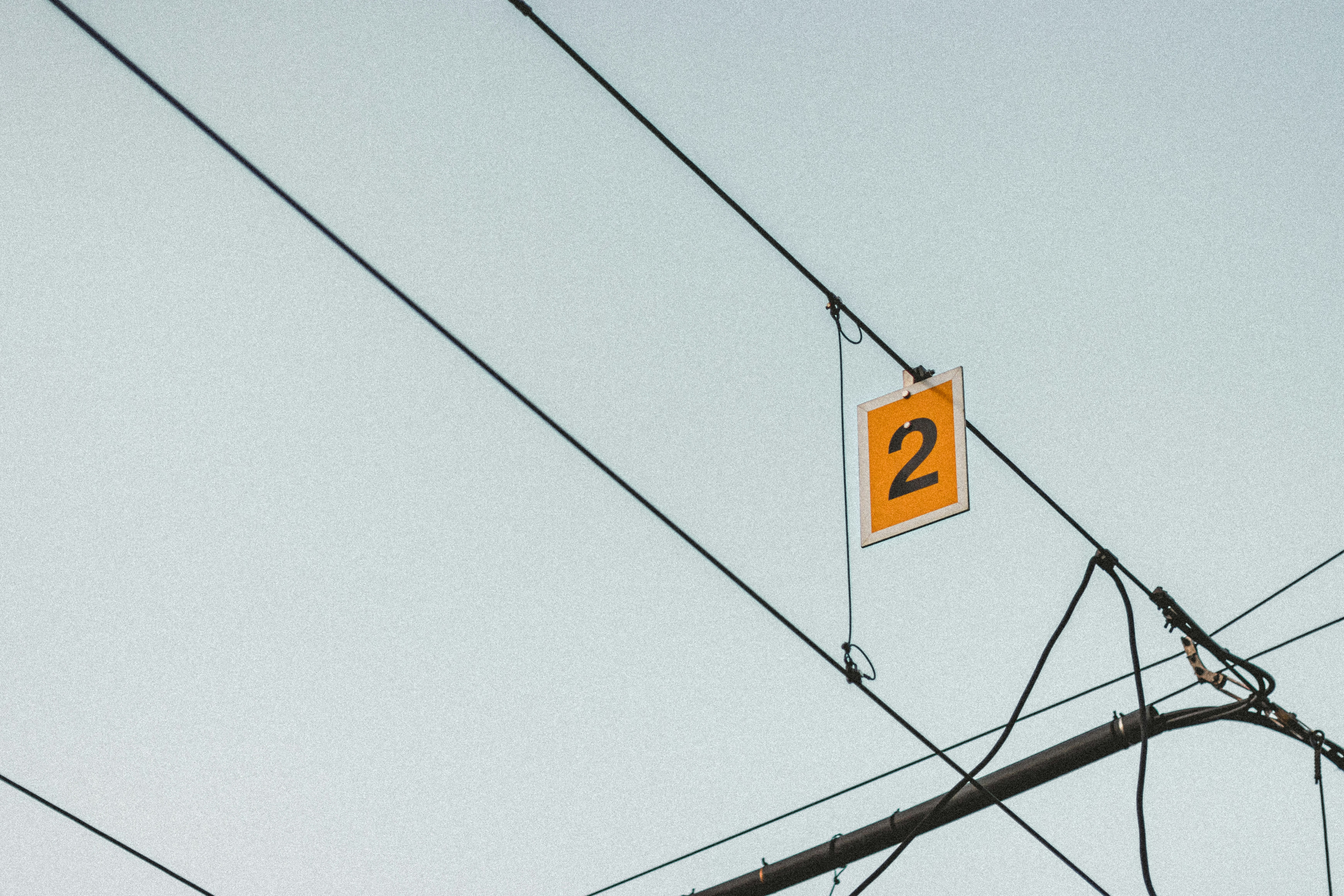 yellow and black street sign